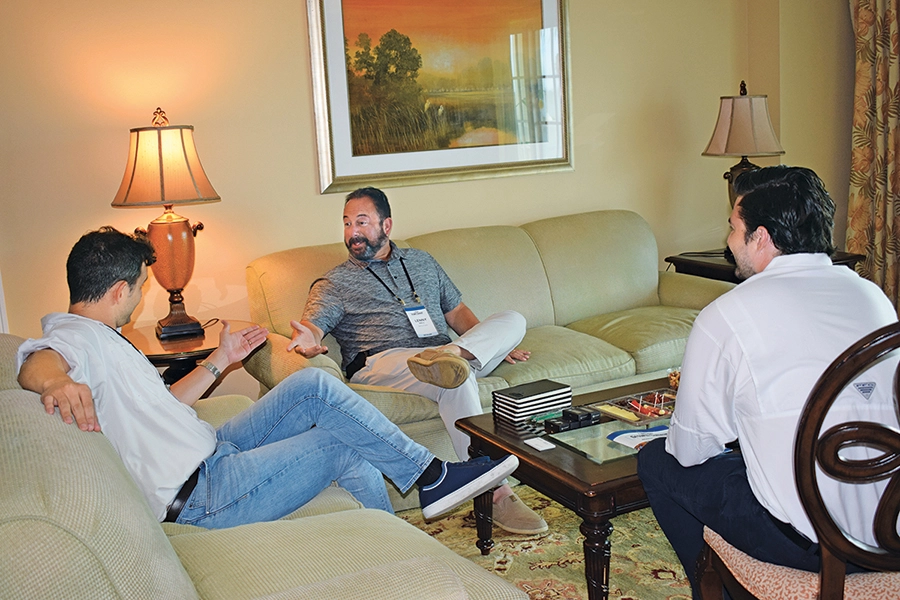 Meeting during a recent LM Growth Summit